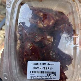 a container of seasoned crab