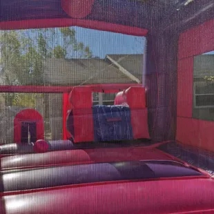 The Purple Castle Bounce House with Slide