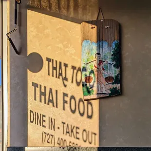 a sign on the side of a building