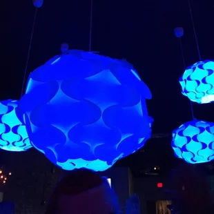 a group of people in a dark room