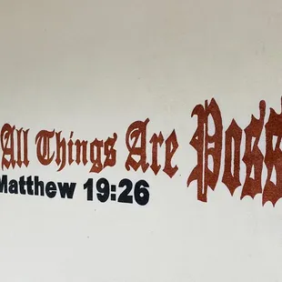 the name of a church on a wall