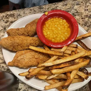 Chicken strips, fries, and corn