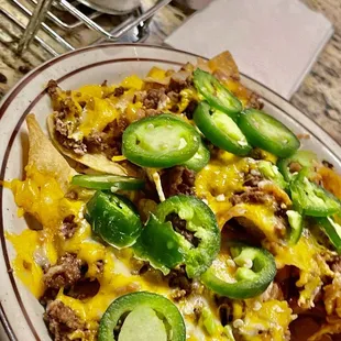 Amazing Nachos!! Jalapeños were fresh and chilled!