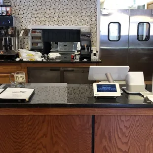 the counter and the coffee machine
