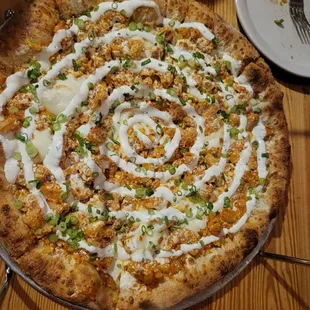 Kirk&apos;s Pie: buffalo chicken pasta, njuda, mozzarella,  green onion, ranch.