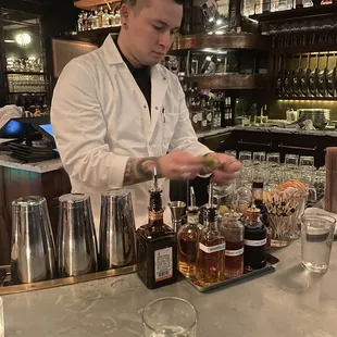 a bartender preparing a drink