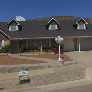 this designer shingle(sienna,heirloom brown) From GAF looks great on high pitched roofs