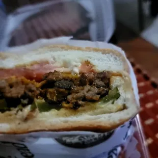 Half a chopped cheese. Packed with meat/other stuff and free chips.
