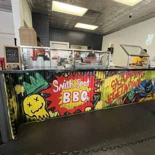 The counter area to make payments, and place orders