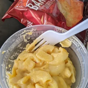 The side macaroni and cheese and chips of your choice that are included with your sandwich