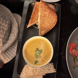 Butternut squash coconuts curry soup and grilled cheese