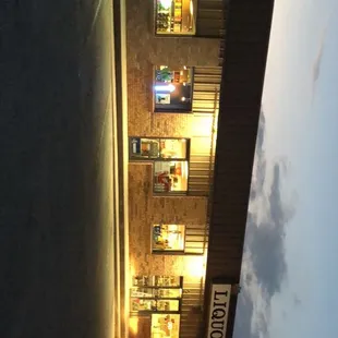 a red car parked in front of a building