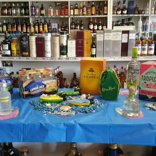 a table with bottles of liquor