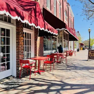 a brick building with awnings