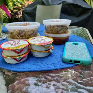 1/2 pint of BBQ and 1/2 pint of baked beans. YOU MUST TELL THEM YOU WANT SAUCE, THEY WILL NOT ASK YOU. Cellphone for thickness comparison.