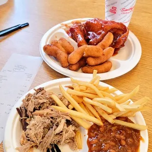 8/24/23 Combination plate dinner Pulled pork two piece barbecue chicken hush puppies no slaw or tater salad fries and baked beans Coke Zero