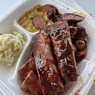 Delicious Ribs / Sausage / Brisket &amp; Chicken  Potato salad &amp; cream corn is what I ordered!