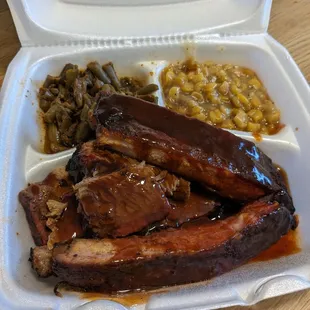 Brisket, ribs, creamed corn, and green beans
