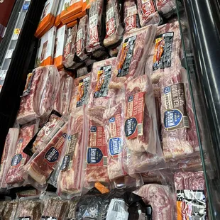 a display of meat in a grocery store