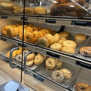 a variety of bagels on display