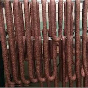 Chaurice Smoked Sausage fresh out of our Smokehouse.