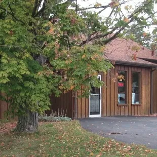 a sign in front of a building