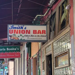a sign for smith's union bar