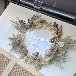 a wreath made of dried plants