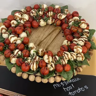 Charcuterie table option: mozzarella balls, fresh basil from the Smitty garden &amp; grape tomatoes with balsamic drizzle