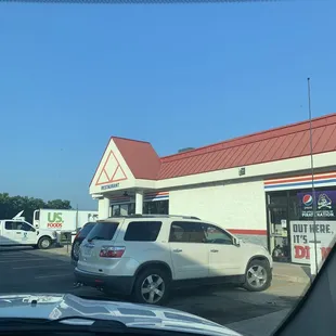 Next to gas station
