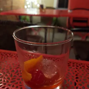 a shot of a drink in a glass