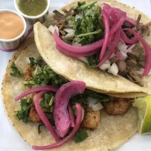 Shrimp taco and carnitas taco