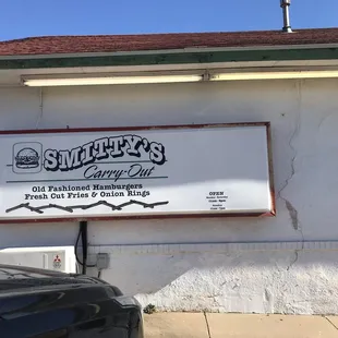 a sign on the side of a building