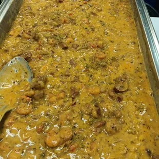 Creo dish Crawfish, shrimp sausage, Sautee with onion's bell pepper creamy sauce served over seemed rice.