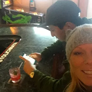 cool pinball machine, strong drink, good friends