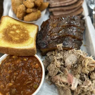 Brisket (pass), ribs (decent), pulled pork (juicy, great flavor). Corn nuggets (so good!), toast, Brunswick stew (pretty good).