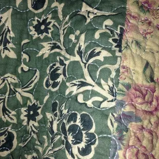 a close up of a quilt