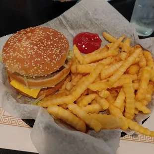 Smutty burger with fries.