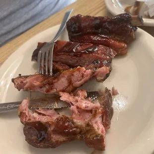 Pulled pork is nasty and dry, our sever said it would be falling of the bone but it was more like stuck on the bone