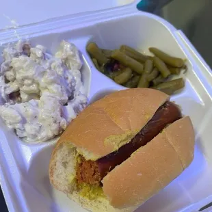 Hot link sandwich can green beans &amp; some type of nasty potato's.