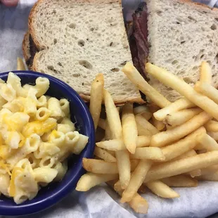 Pastrami on rye with fries and mac and cheese