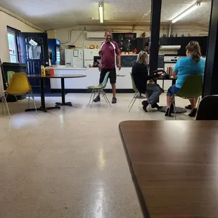 a group of people sitting at a table