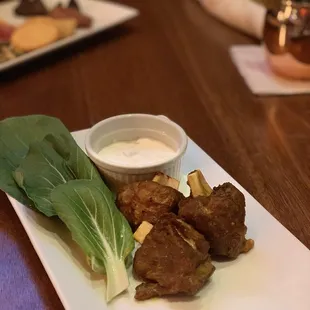 Pork wings with tahini sauce