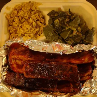 Three Pork Rib Plate with dirty rice and collard greens