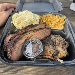 Brisket, pulled pork, corn and potato salad