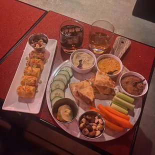 a tray of snacks and drinks