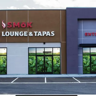 the exterior of a cigar lounge and tapas
