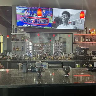 The main bar with the humidor behind it.