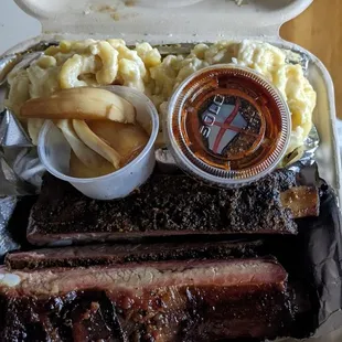 Ribs plate with double Mac and cheese, onions, and spicy bbq.