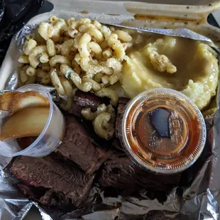 Brisket plate with mashed potatoes and Mama's Mac.